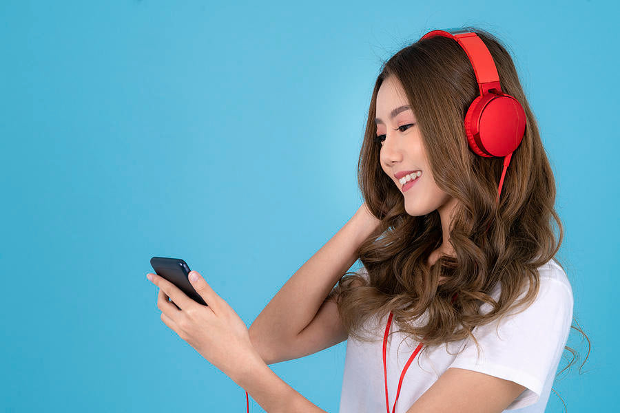 2-asian-woman-with-headphones-and-listening-to-music-anek-suwannaphoom